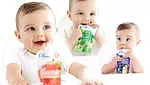 babies eating plum pouches food