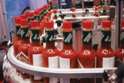 tobasco bottles, conveyor belt