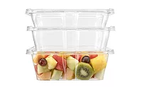 A stack of clear plastic containers, the bottom full of mixed fruit