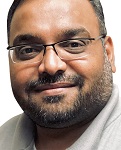 Sanjay Amin, Totani America